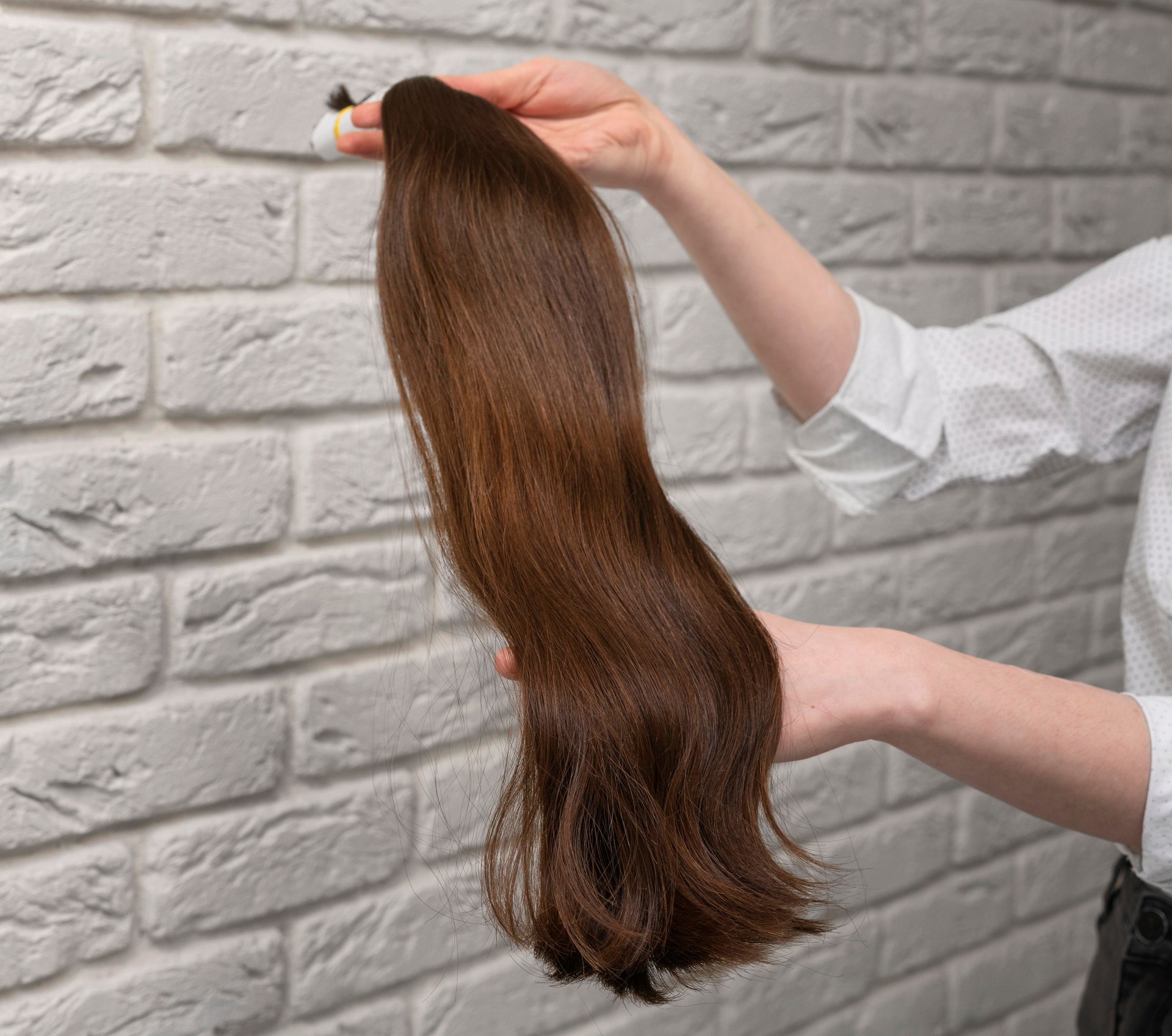 Styled hair extensions in beauty salon